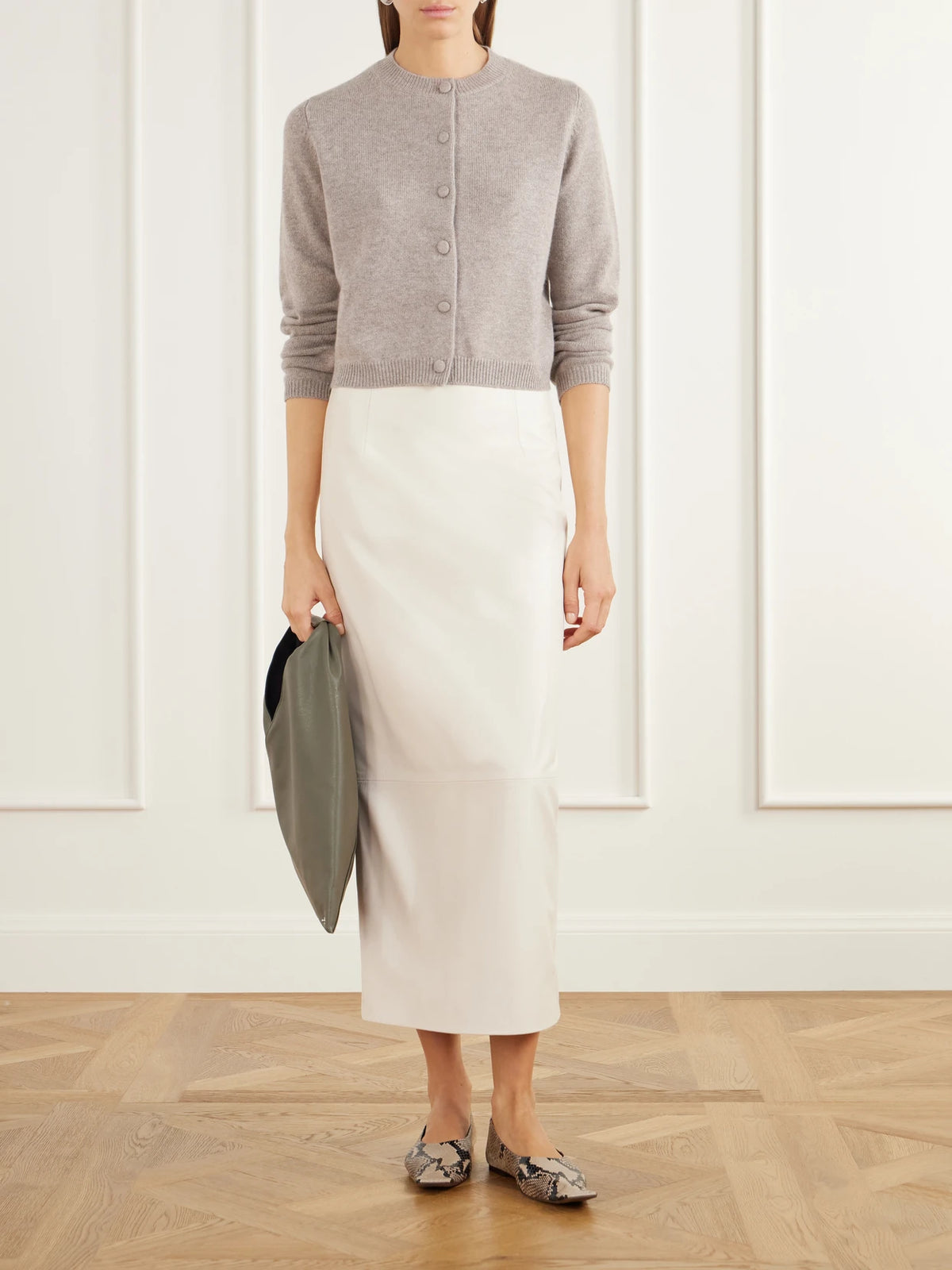 Image of a model wearing Outerwear. Product name - Cropped Rib-trimmed Cashmere Cardigan in Beige colour by brand - Allude