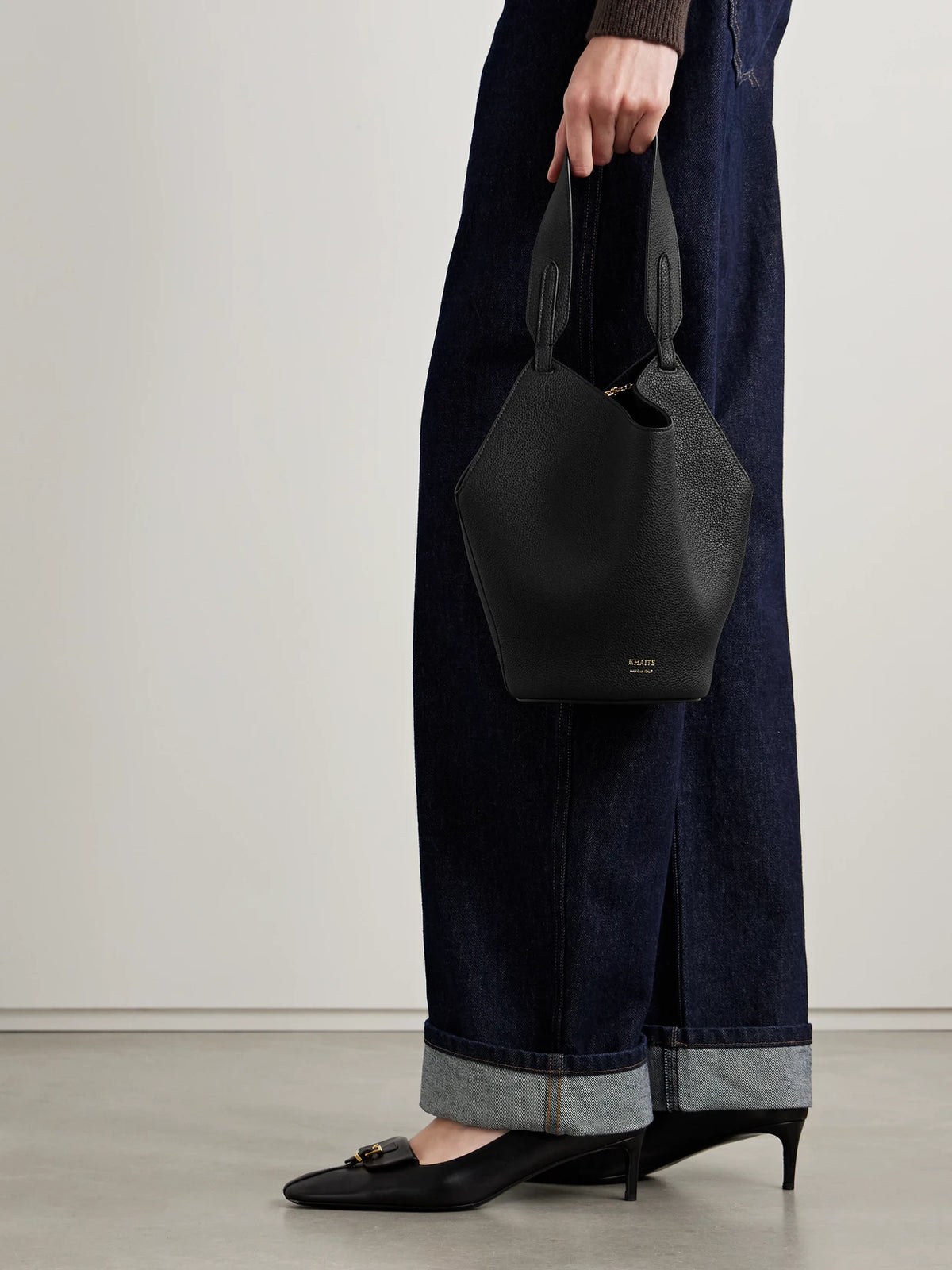 Image of Bags. Product name - Lotus Mini Textured-leather Tote in Black colour by brand - KHAITE