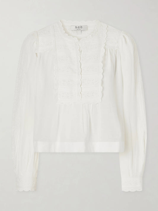 Image of a model wearing Tops. Product name - Eliza Broderie Anglaise-trimmed Cotton-blend Blouse in White colour by brand - Sea