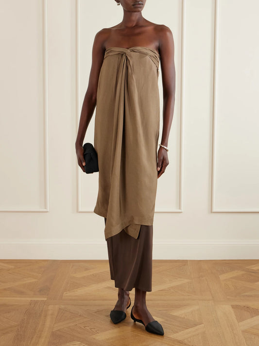 Image of a model wearing Tops. Product name - Knotted Woven Tunic in Brown colour by brand - RÓHE