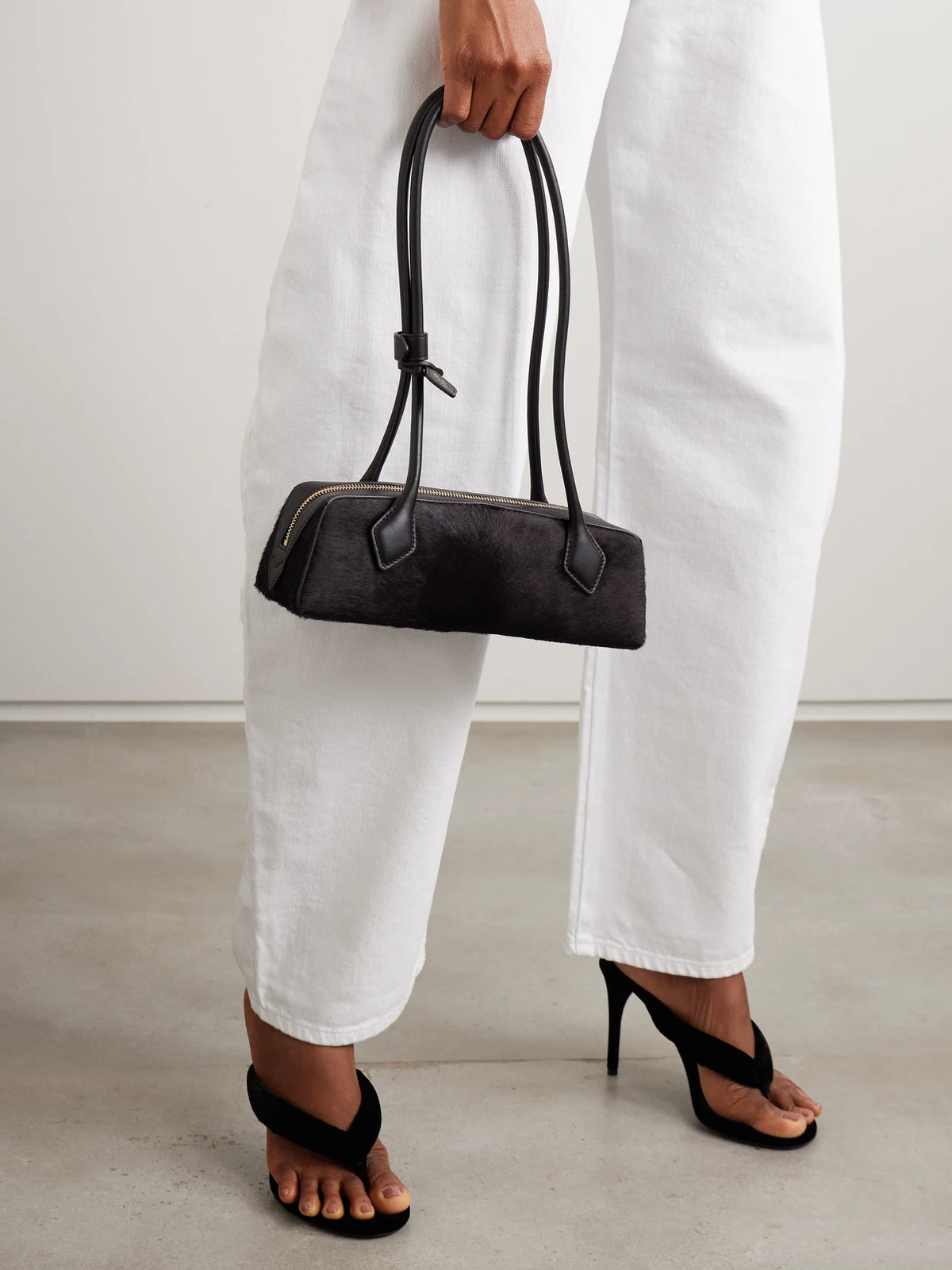 Image of Bags. Product name - Le Teckel Small Leather-trimmed Calf Hair Shoulder Bag in Dark brown colour by brand - Alaïa