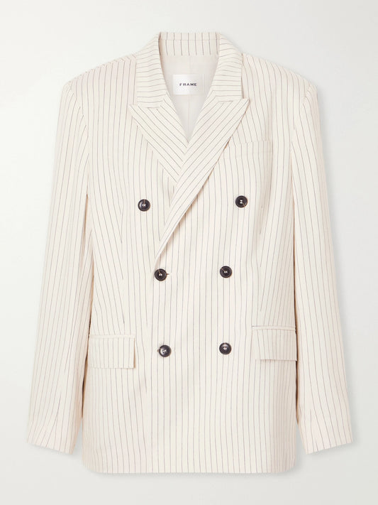 Image of a model wearing Outerwear. Product name - The Avenue Double-breasted Striped Blazer in White colour by brand - FRAME
