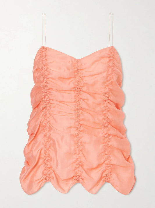 Image of a model wearing Tops. Product name - Inara Draped Silk-blend Top in Coral colour by brand - KHAITE