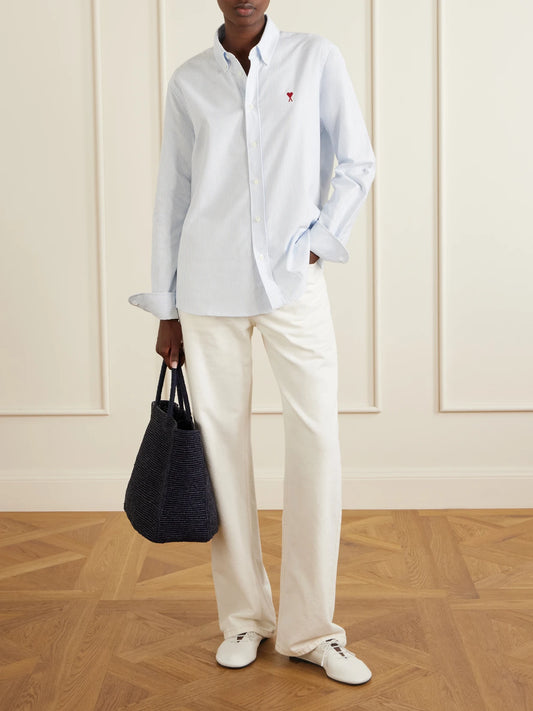 Image of Jeans. Product name - Mid-rise Wide-leg Jeans in Cream, Red colour by brand - AMI PARIS
