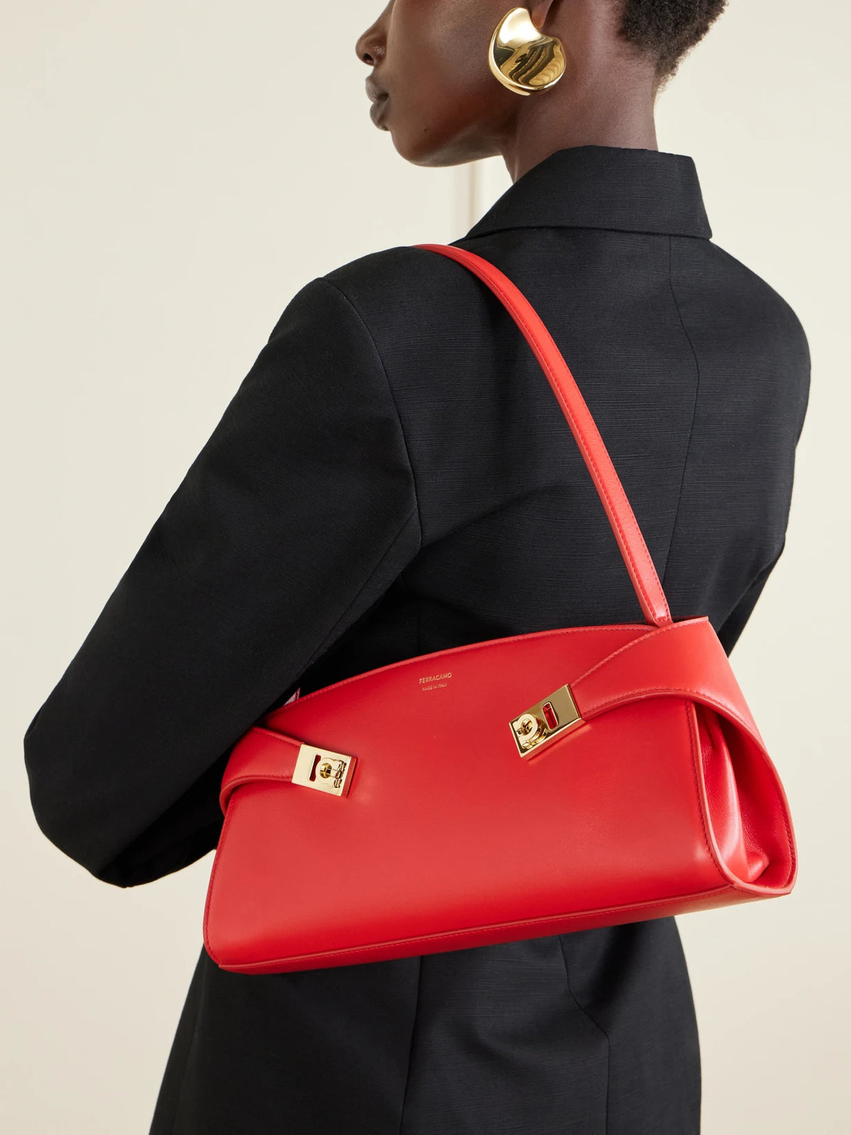Image of Bags. Product name - Hug Leather Shoulder Bag in Red colour by brand - Ferragamo