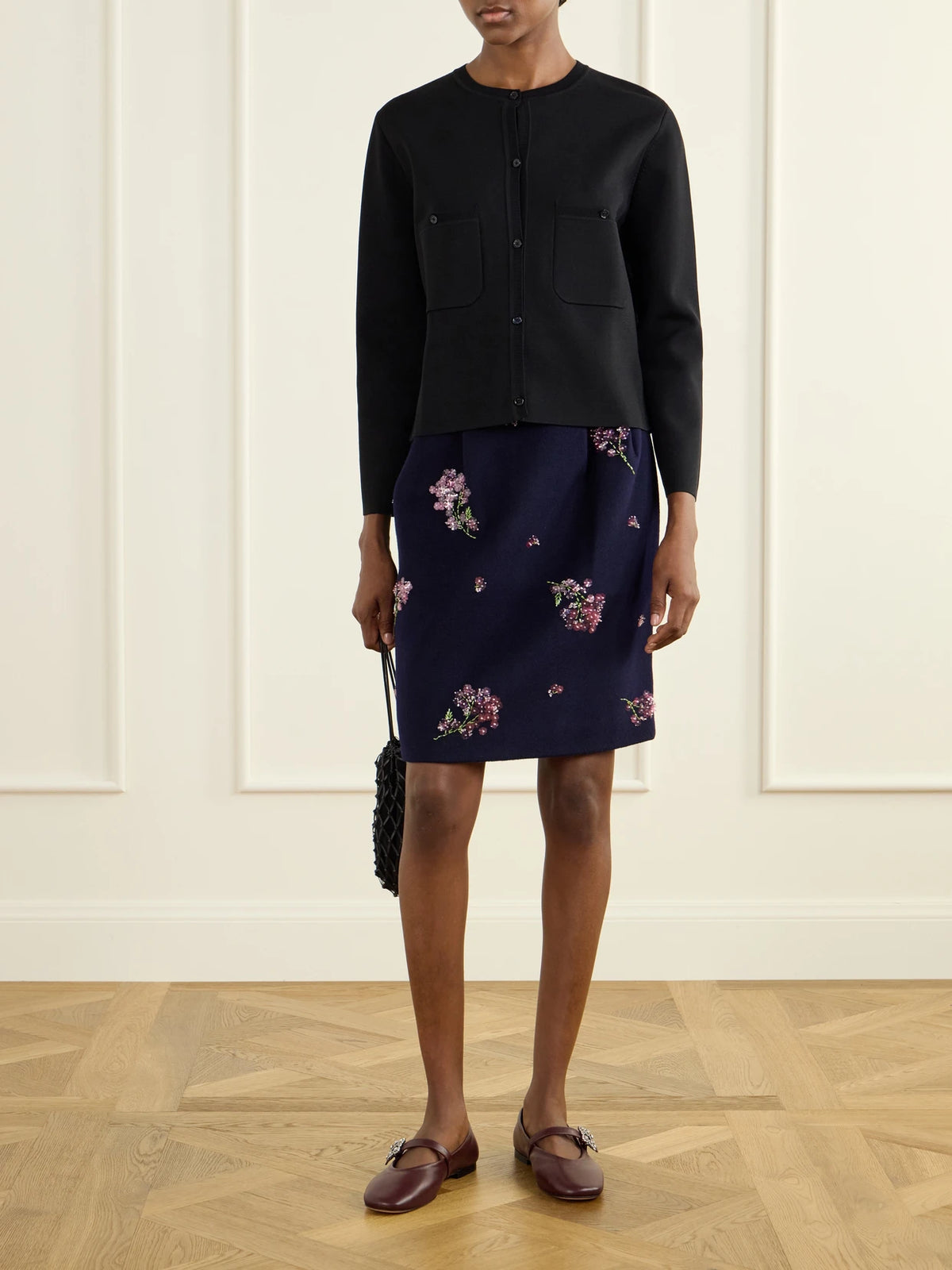 Image of a model wearing Skirts. Product name - Sequin-embellished Wool Midi Skirt in Multi colour by brand - SHUSHU/TONG