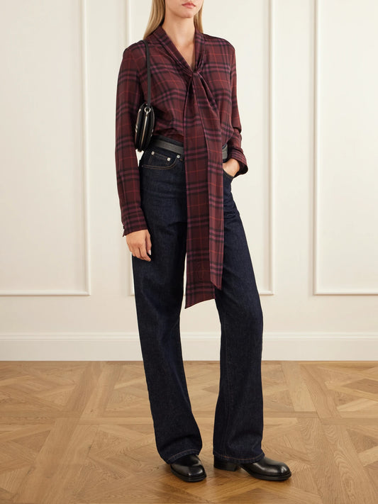 Image of a model wearing Tops. Product name - Rhiannon Pussy-bow Checked Silk-crepe Blouse in Burgundy colour by brand - Burberry