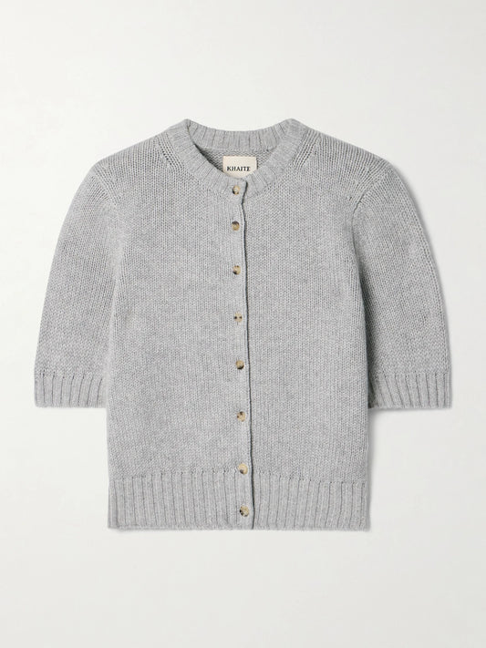 Image of a model wearing Outerwear. Product name - Nora Cropped Cashmere Cardigan in Gray colour by brand - KHAITE