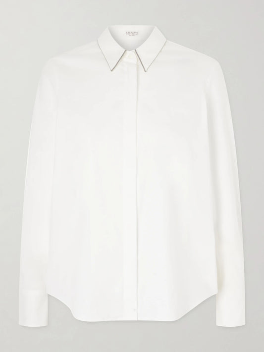 Image of a model wearing Tops. Product name - Embellished Cotton-blend Shirt in White colour by brand - Brunello Cucinelli