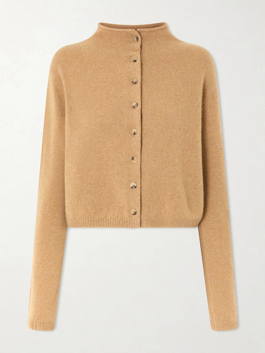 Image of a model wearing Outerwear. Product name - Annora Wool And Cashmere-blend Turtleneck Cardigan in Beige colour by brand - KHAITE