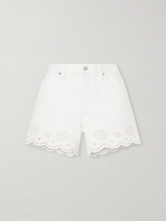Image of a model wearing Shorts. Product name - Broderie Anglaise-trimmed Denim Shorts in White colour by brand - FRAME