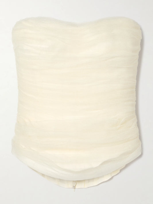 Image of a model wearing Tops. Product name - Milo Organza And Grosgrain-trimmed Ruched Tulle Bustier Top in Off-white colour by brand - Danielle Frankel