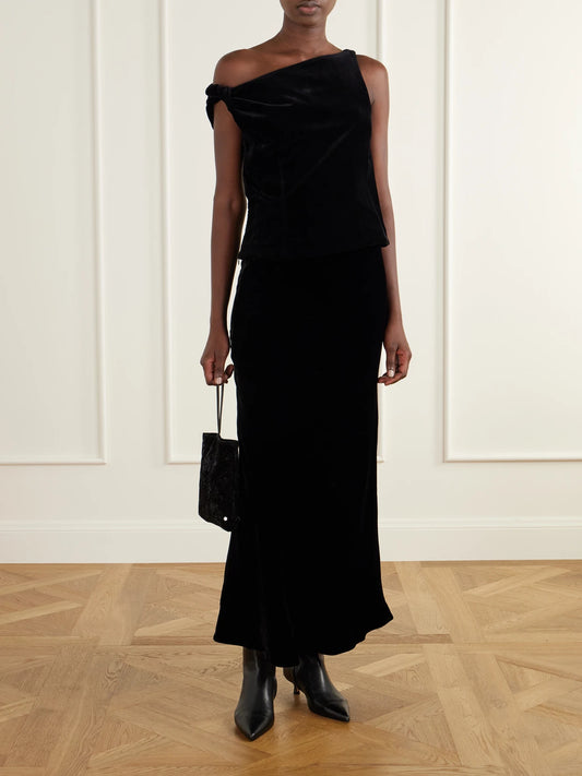Image of a model wearing Tops. Product name - Draped Cotton-velvet Top in Black colour by brand - RÓHE