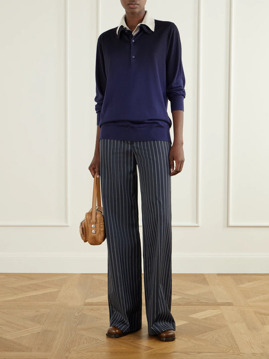 Image of a model wearing Outerwear. Product name - Layered Silk, Wool And Cashmere-blend Polo Sweater in Navy colour by brand - Acne Studios