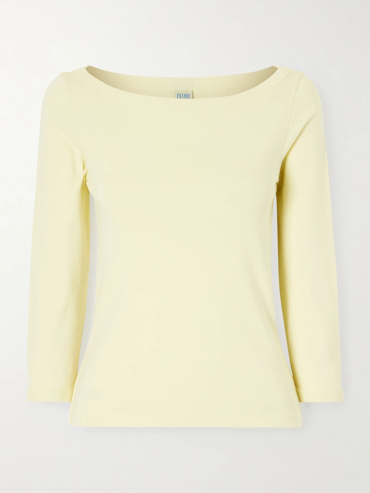 Image of a model wearing Tops. Product name - Steffi Ribbed Organic Cotton-jersey T-shirt in Pastel yellow colour by brand - FLORE FLORE