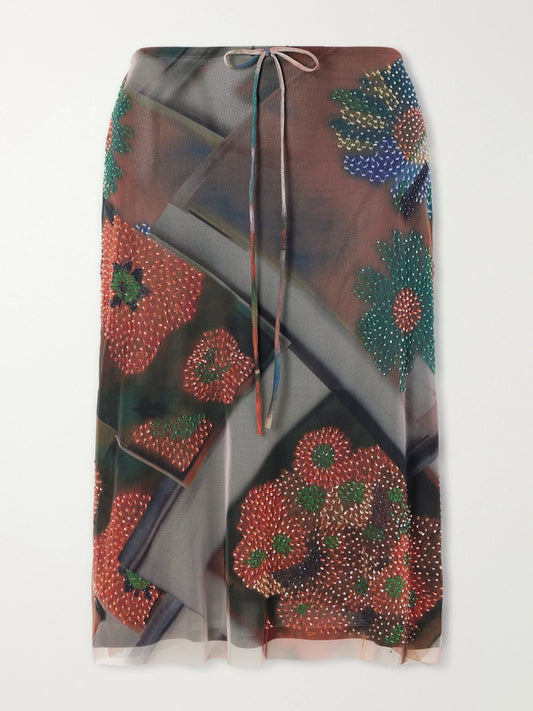 Image of a model wearing Skirts. Product name - Lucia Bead-embellished Printed Tulle Midi Skirt in Multi colour by brand - STAUD