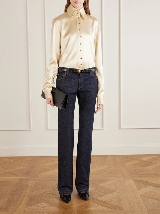 Image of Jeans. Product name - Conforti Mid-rise Bootcut Jeans in Dark denim colour by brand - KHAITE