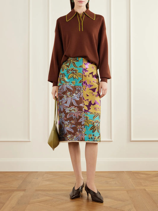 Image of a model wearing Outerwear. Product name - Rosette Merino Wool-piqué Polo Sweater in Brown colour by brand - ALÉMAIS