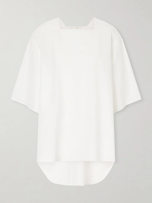 Image of a model wearing Tops. Product name - Hamza Oversized Cotton-poplin Top in White colour by brand - The Row