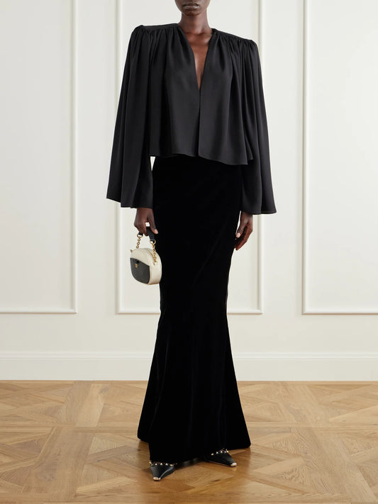 Image of a model wearing Skirts. Product name - Sable Draped Velvet Maxi Skirt in Black colour by brand - Valentino Garavani