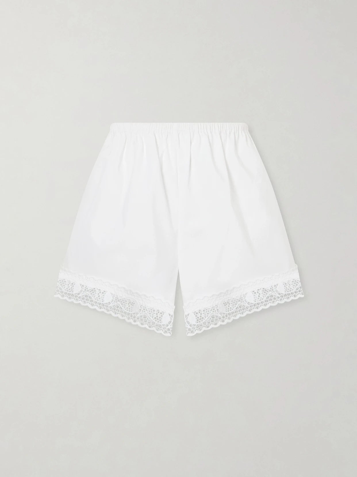 Image of a model wearing Shorts. Product name - +da Adolfo Brezza Cotton-blend Shorts in White colour by brand - STAUD