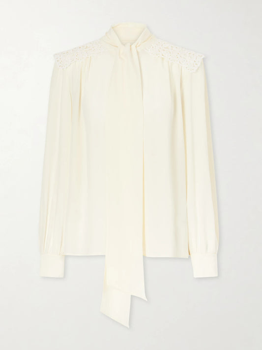 Image of a model wearing Tops. Product name - Pussy-bow Crochet-trimmed Silk Crepe De Chine Shirt in White colour by brand - Chloé