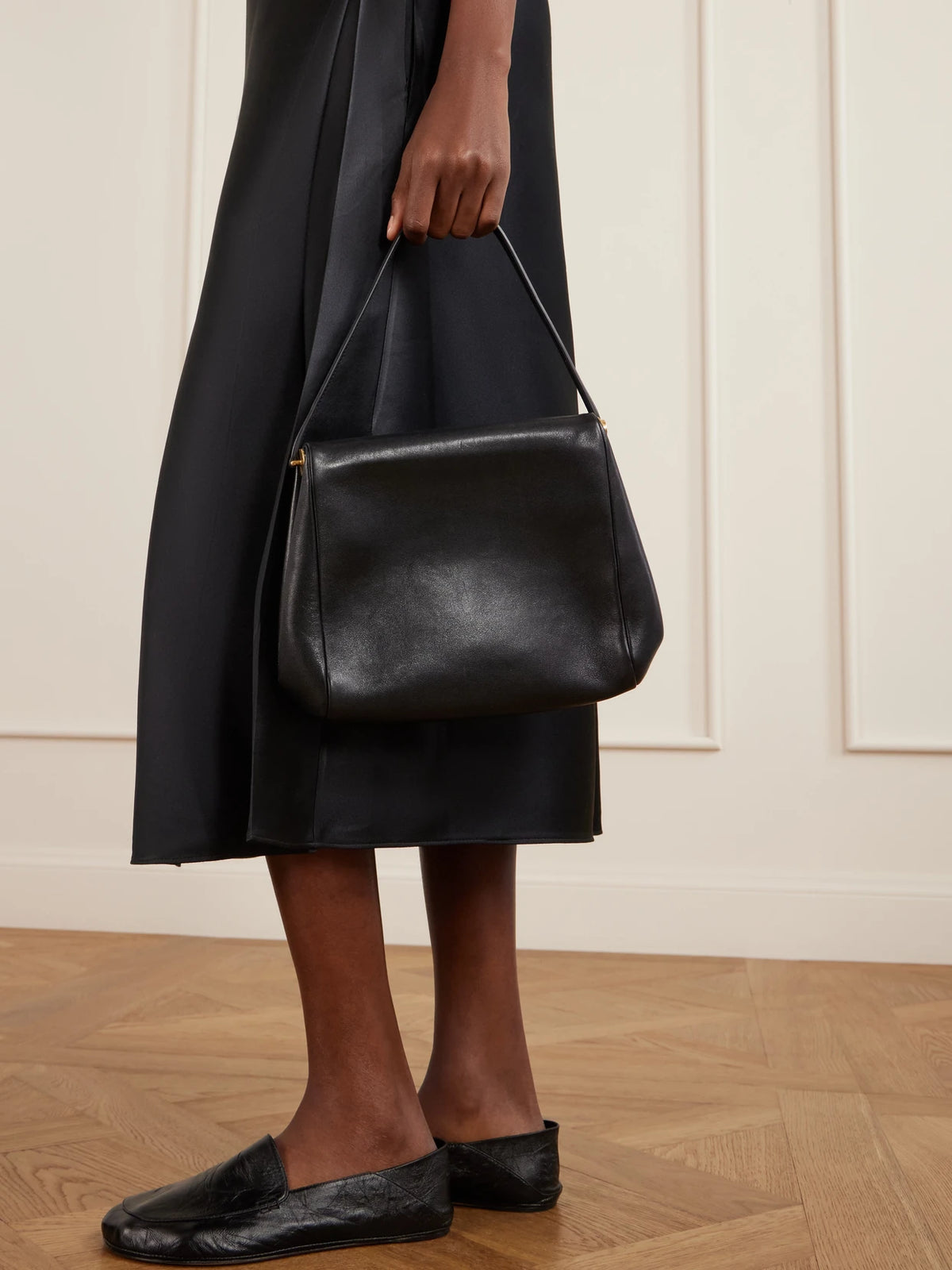 Image of Bags. Product name - Tina Small Leather Shoulder Bag in Black colour by brand - Calvin Klein Collection