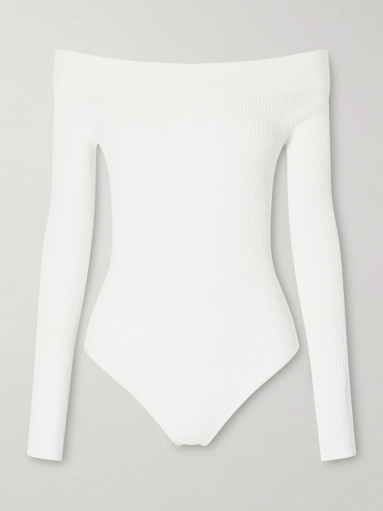 Image of a model wearing Tops. Product name - Off-the-shoulder Ribbed-knit Bodysuit in White colour by brand - Alaïa