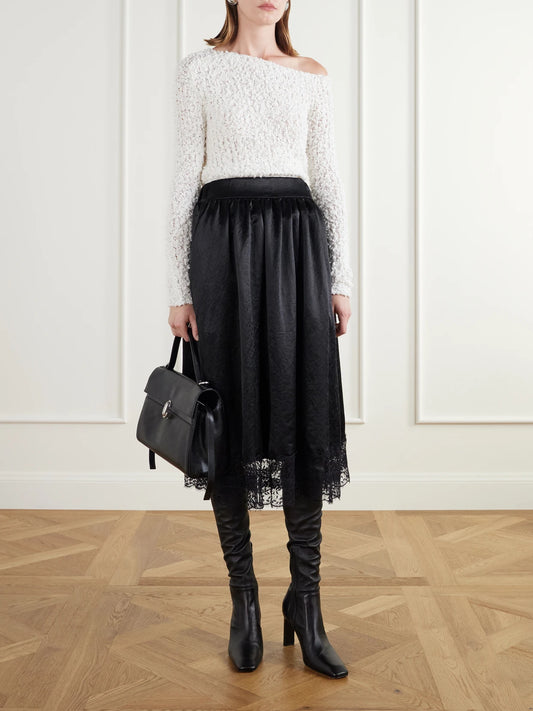 Image of a model wearing Skirts. Product name - Gathered Lace-trimmed Crinkled Satin Midi Skirt in Black colour by brand - Maria McManus