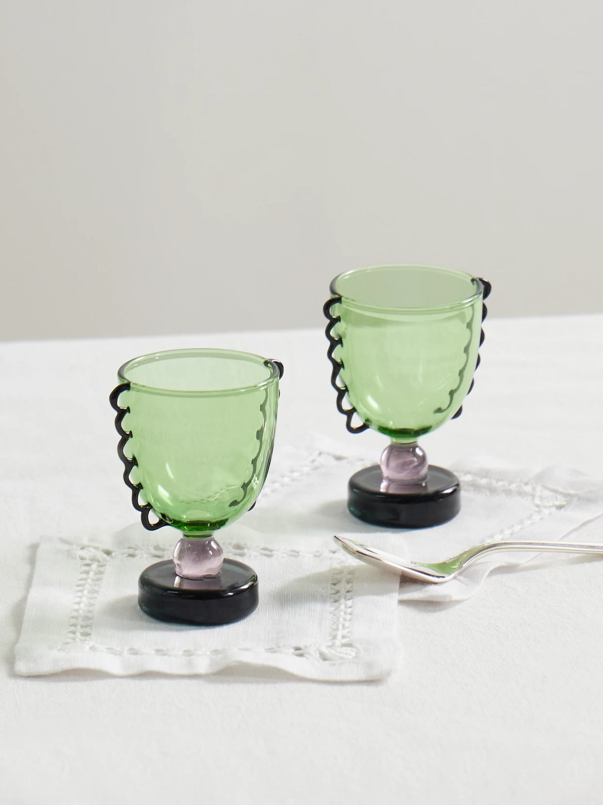 Image of Tableware. Product name - Coco Set Of Two Glass Egg Cups in Green colour by brand - Sophie Lou Jacobsen