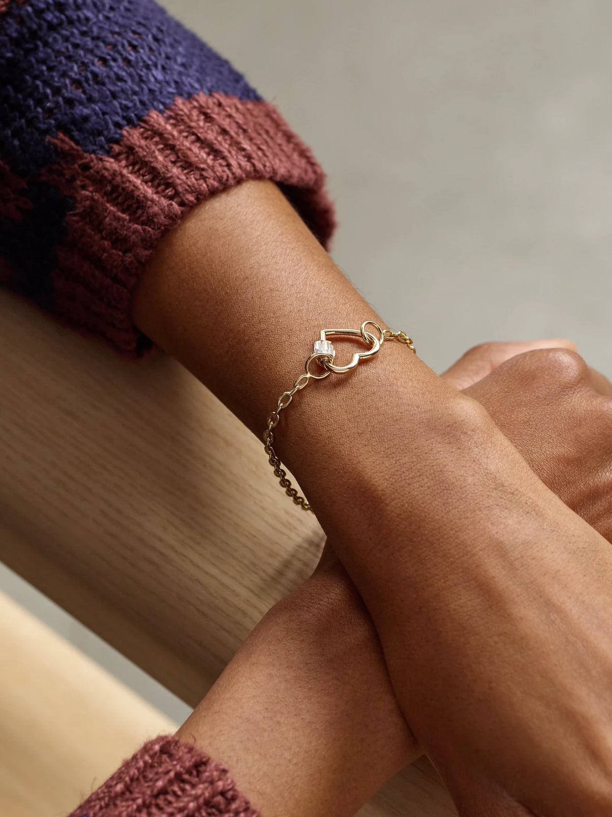 Image of Bracelets. Product name - Baguette Baby Heart Lock + Pulley Chain 14-karat Gold Diamond Bracelet in Multi colour by brand - Marla Aaron