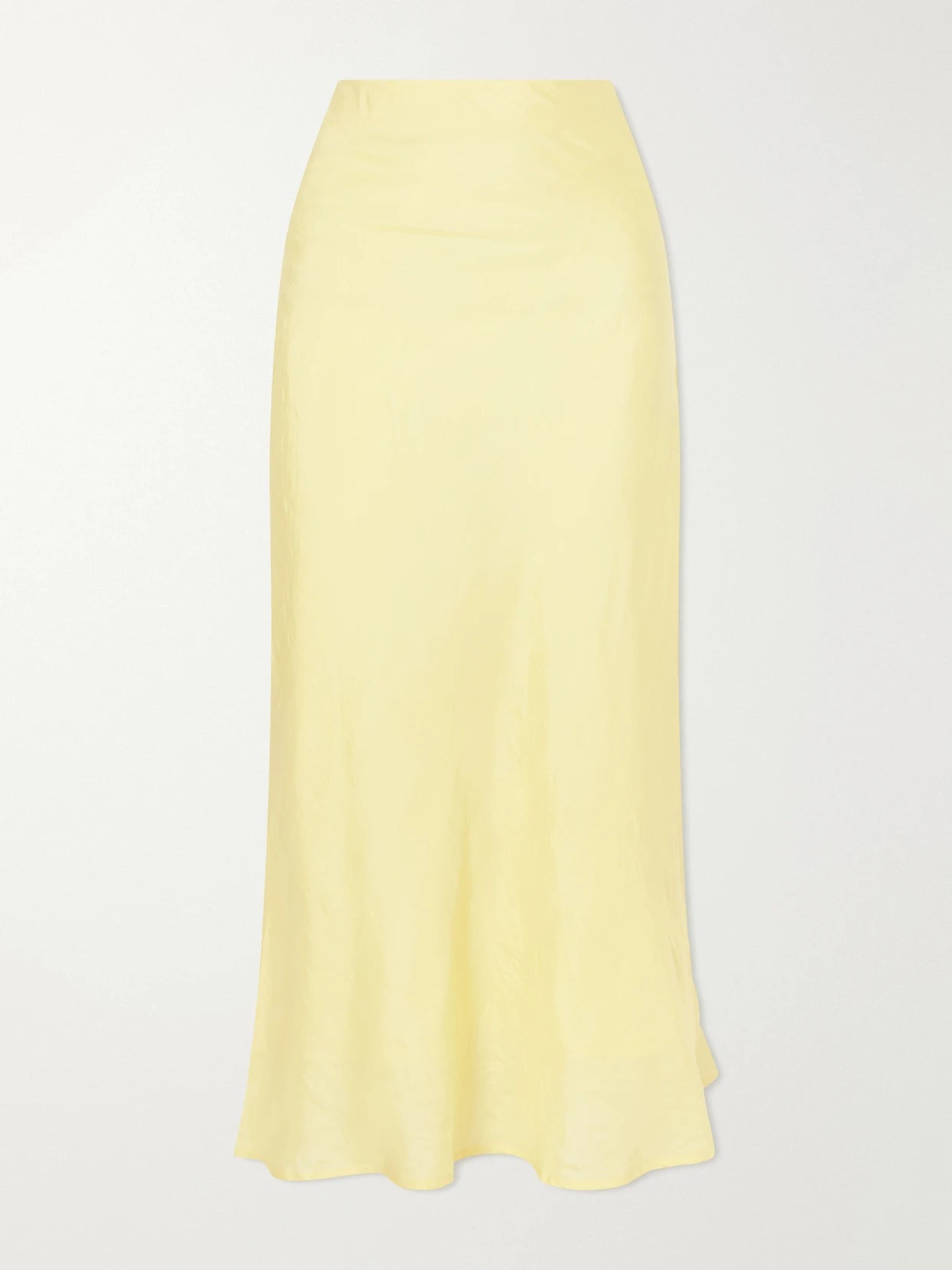Image of a model wearing Skirts. Product name - Lyra Sunlight Silk Midi Skirt in Pastel yellow colour by brand - ALIX OF BOHEMIA