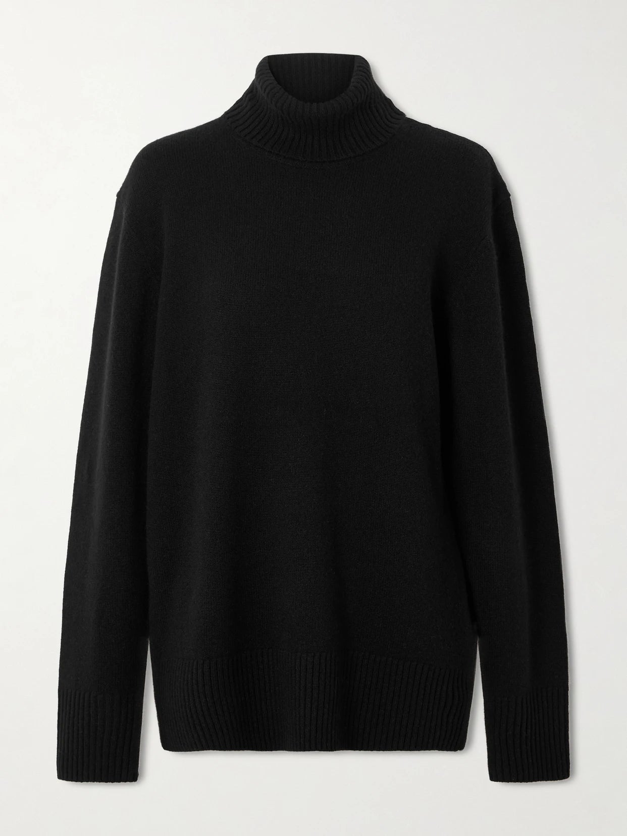Image of a model wearing Outerwear. Product name - Cashmere Turtleneck Sweater in Black colour by brand - TOTEME