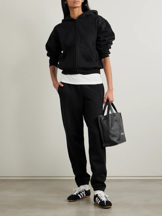 Image of Sleepwear & Loungewear. Product name - Classic Joggers in Black colour by brand - SKIMS