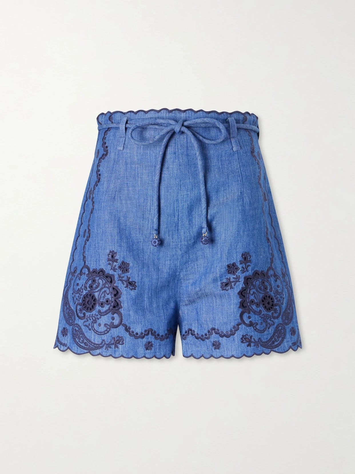Image of a model wearing Shorts. Product name - Aster Scalloped Embroidered Denim Shorts in Blue colour by brand - Zimmermann