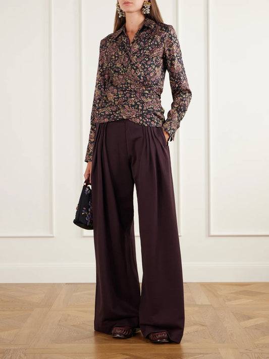 Image of a model wearing Pants. Product name - Pleated Cotton-jersey Wide-leg Pants in Plum colour by brand - Dries Van Noten