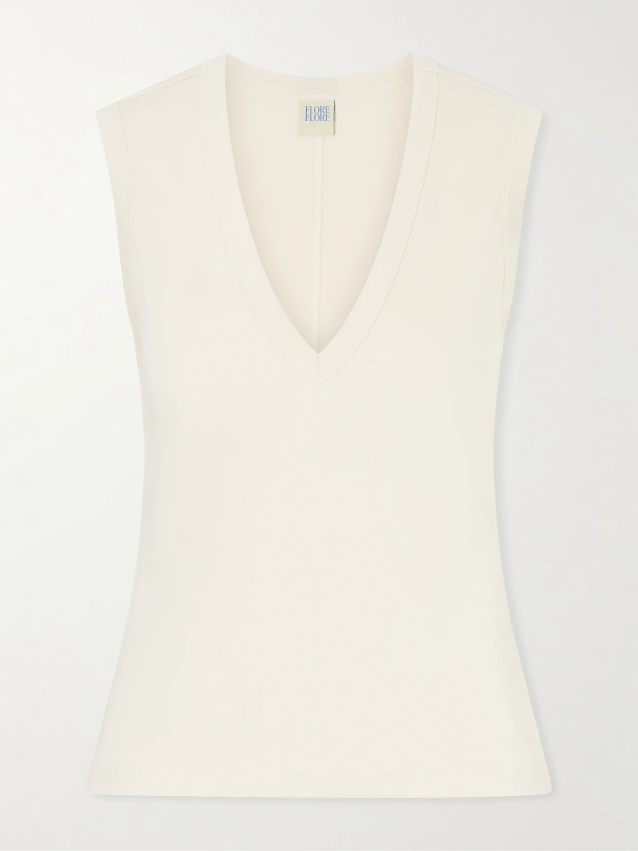 Image of a model wearing Tops. Product name - Dewi Organic Cotton-jersey Tank in Ivory colour by brand - FLORE FLORE