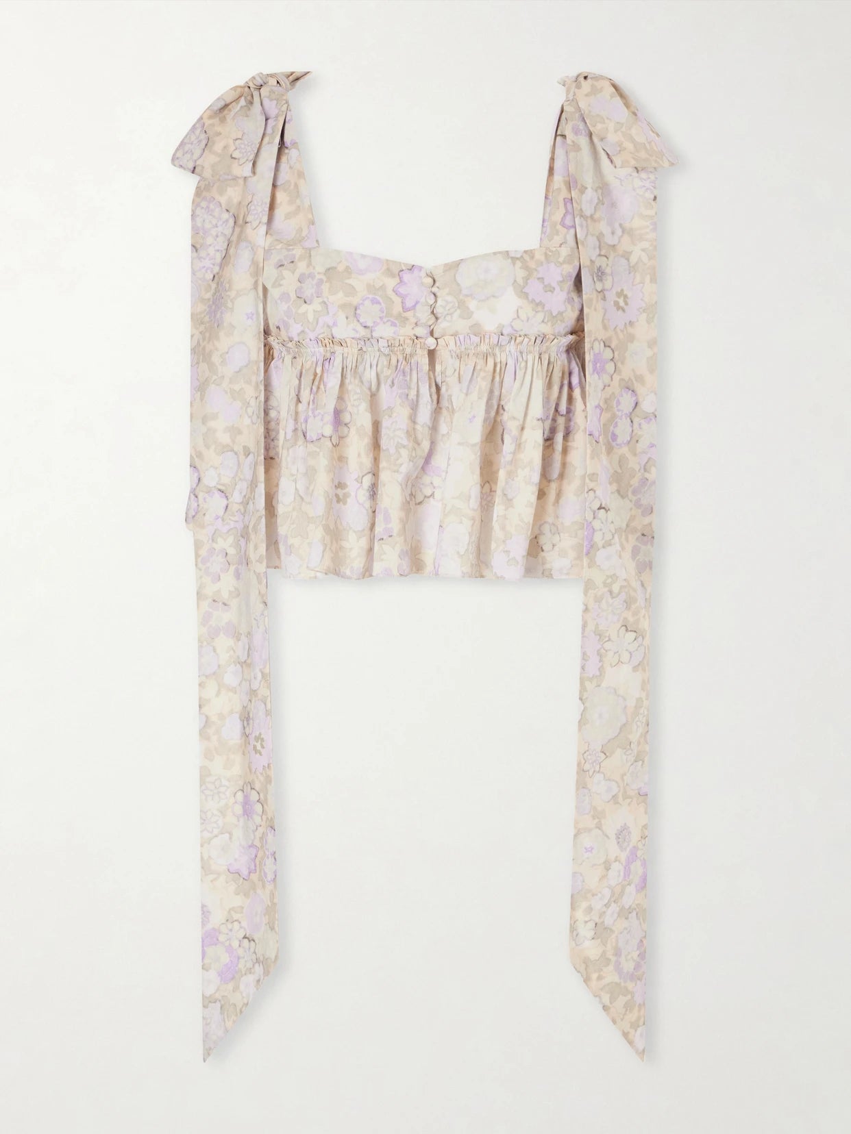 Image of a model wearing Tops. Product name - Bow-detailed Ruffled Floral-print Cotton-poplin Top in Purple colour by brand - Chloé