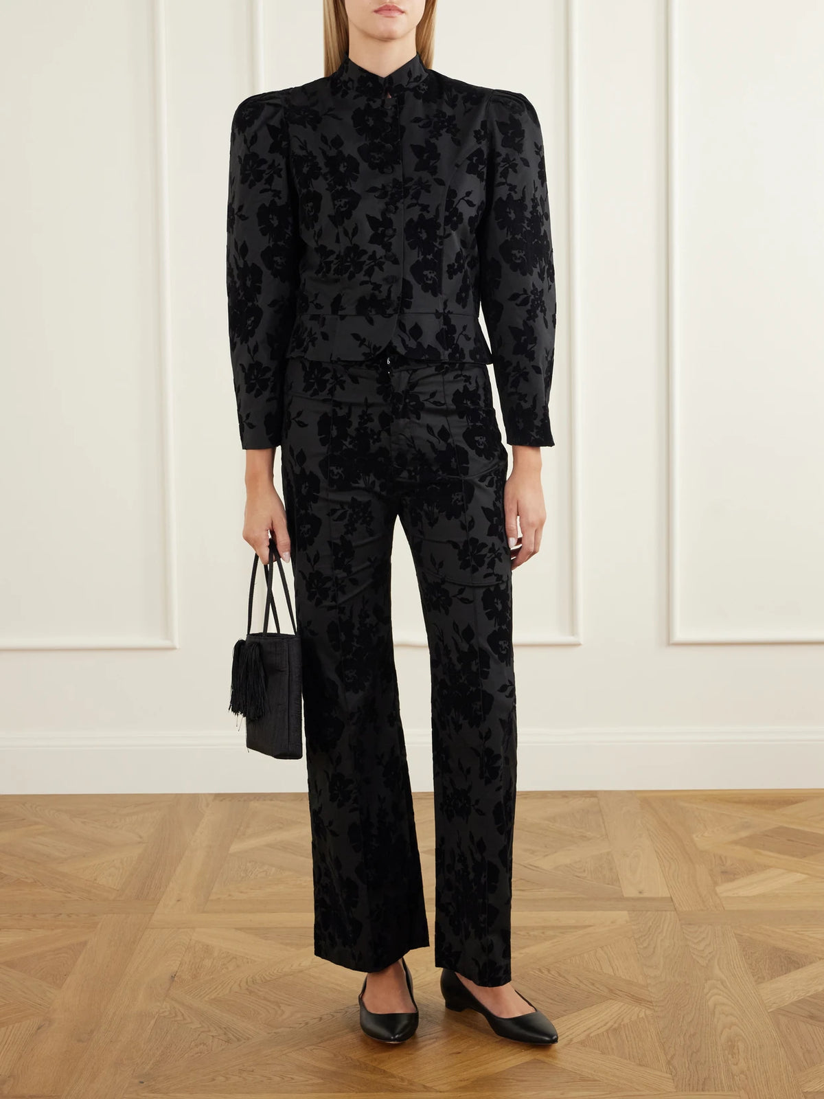 Image of a model wearing Outerwear. Product name - Amoako Devoré Blazer in Black colour by brand - DESTREE