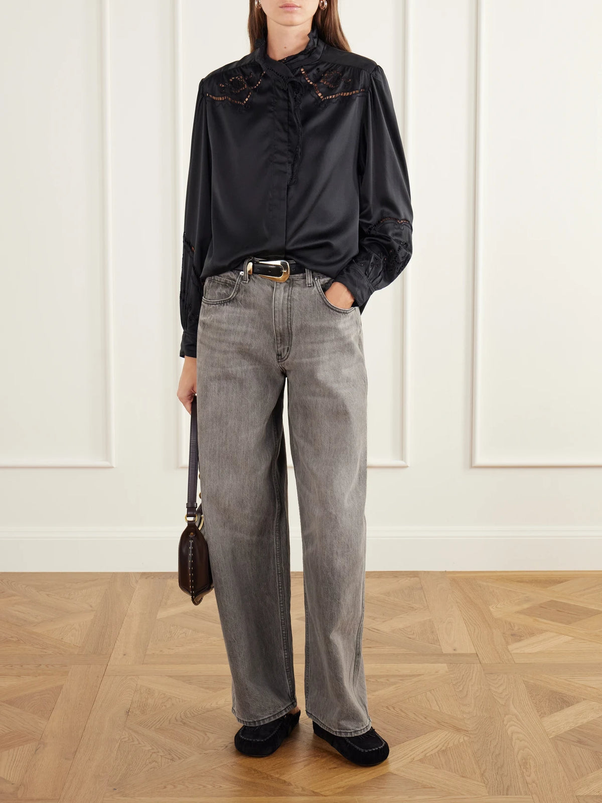 Image of a model wearing Tops. Product name - Ejali Broderie Anglaise Silk-blend Blouse in Black colour by brand - ISABEL MARANT