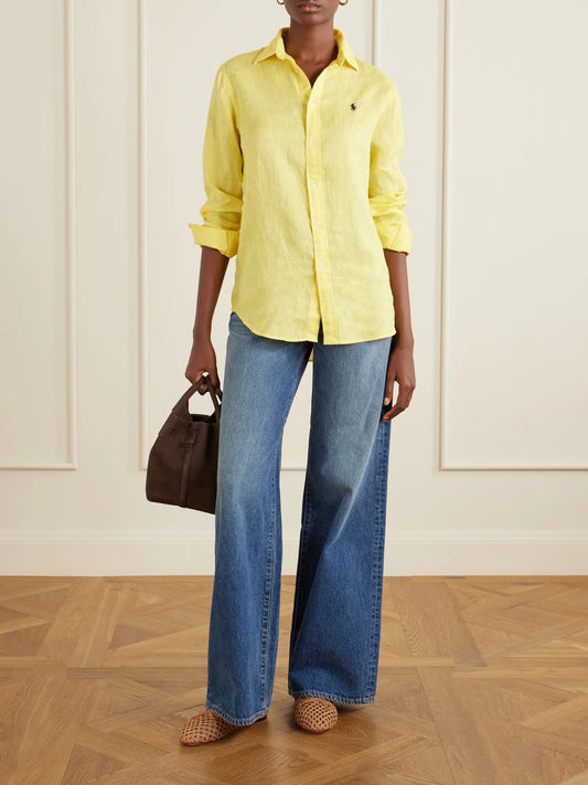 Image of a model wearing Tops. Product name - Logo-embroidered Linen Shirt in Yellow colour by brand - Polo Ralph Lauren