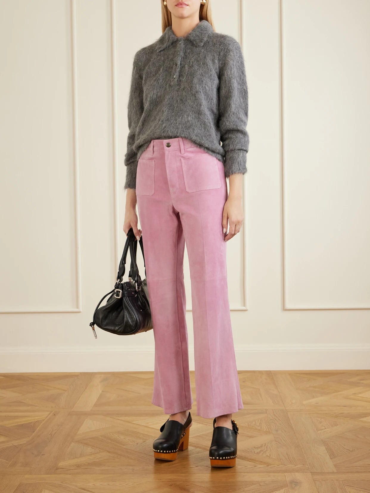 Image of a model wearing Pants. Product name - Suede Straight-leg Pants in Pink colour by brand - Chloé