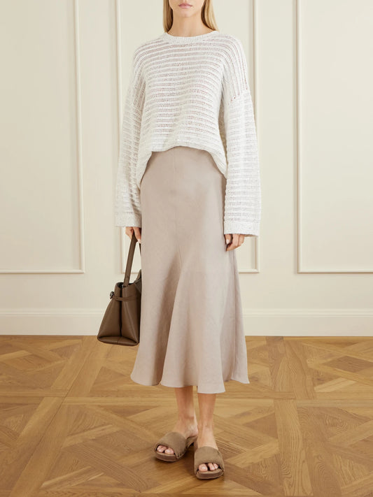 Image of a model wearing Skirts. Product name - Linen Midi Skirt in Sand colour by brand - Brunello Cucinelli
