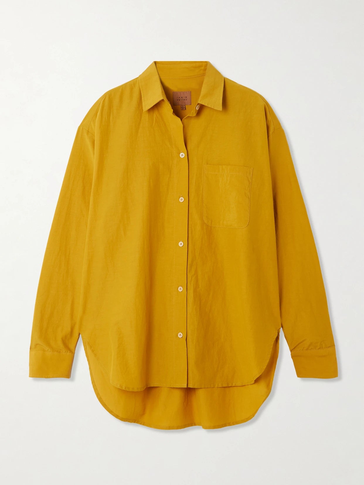 Image of a model wearing Tops. Product name - The Essential Cotton And Silk-blend Shirt in Yellow colour by brand - Jamie Haller