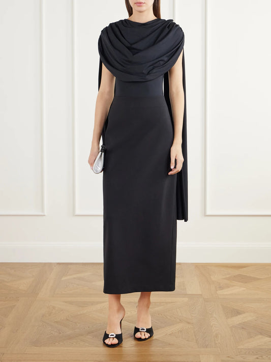 Image of a model wearing Tops. Product name - Burano Cape-detailed Draped Stretch-jersey Bodysuit in Black colour by brand - Maygel Coronel