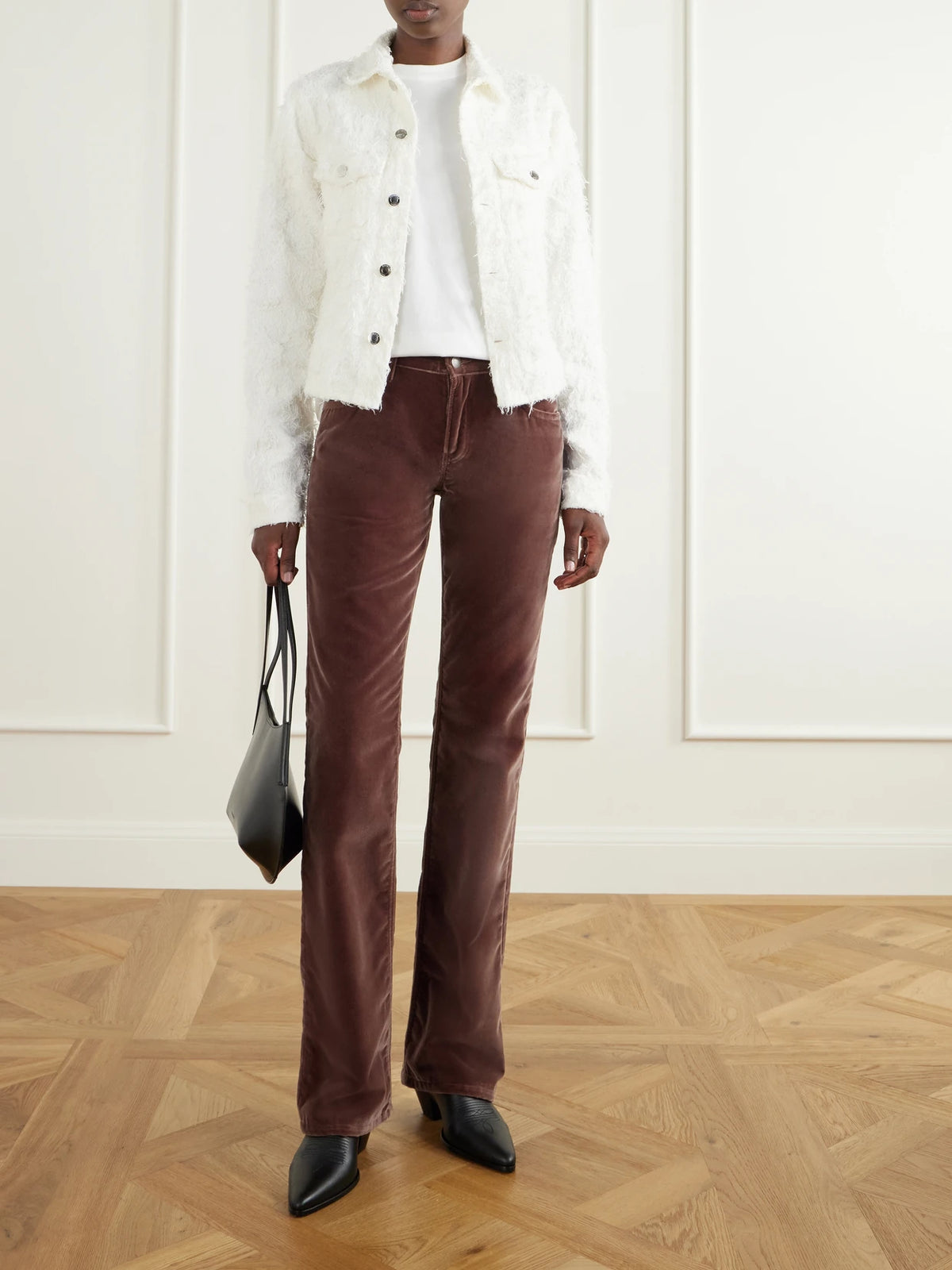 Image of a model wearing Pants. Product name - Carly Cotton-velvet Mid-rise Straight-leg Pants in Brown colour by brand - Haikure