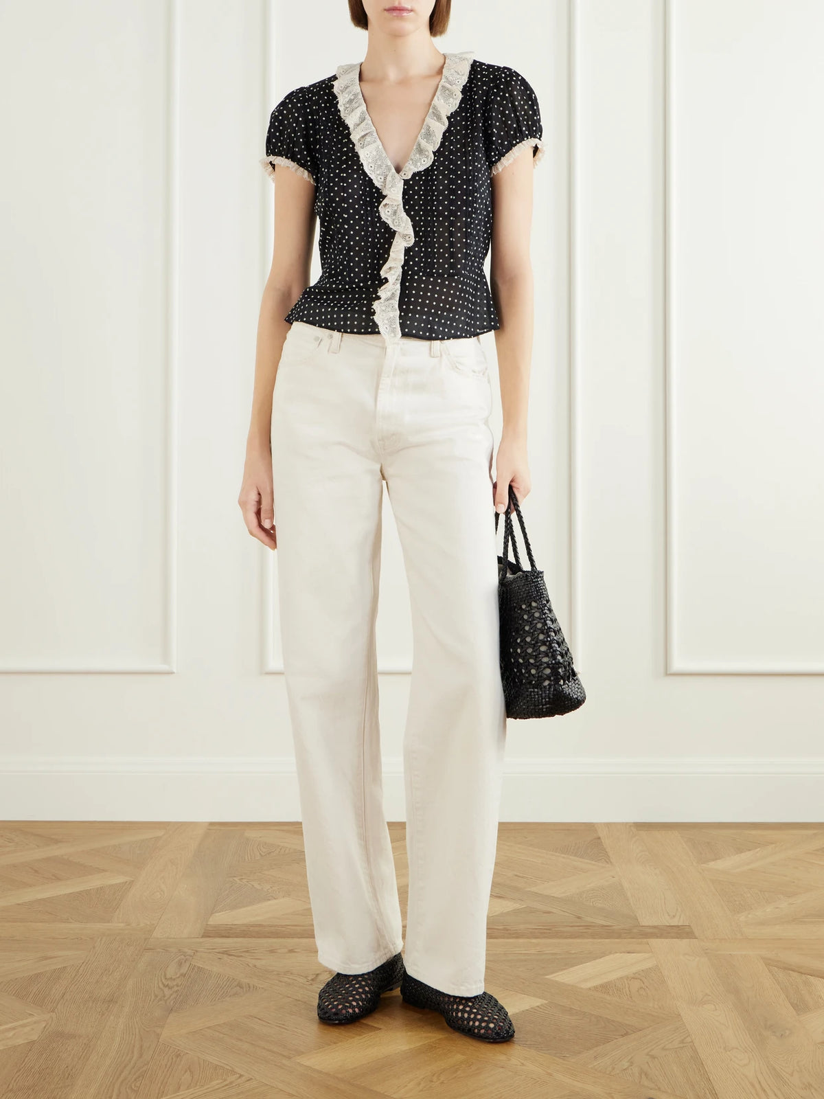 Image of a model wearing Tops. Product name - Orella Lace-trimmed Organic Cotton-voile Blouse in Multi colour by brand - DÔEN