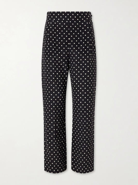 Image of a model wearing Pants. Product name - Polka-dot Silk Crepe De Chine Wide-leg Pants in Black colour by brand - Valentino Garavani