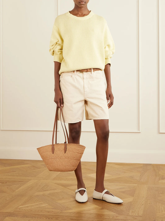 Image of a model wearing Shorts. Product name - Square Cotton Short in Ecru colour by brand - SLVRLAKE