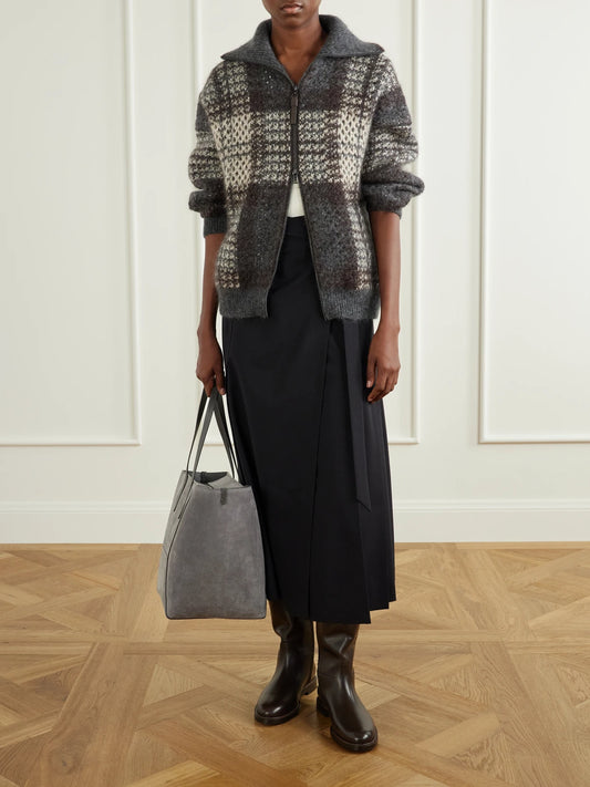 Image of a model wearing Skirts. Product name - Pleated Wool-blend Wrap Midi Skirt in Black colour by brand - Brunello Cucinelli